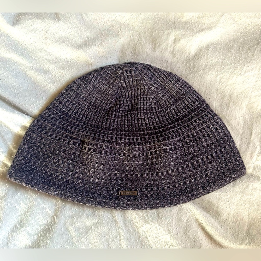 Express winter skull cap with fleece lining around ears.